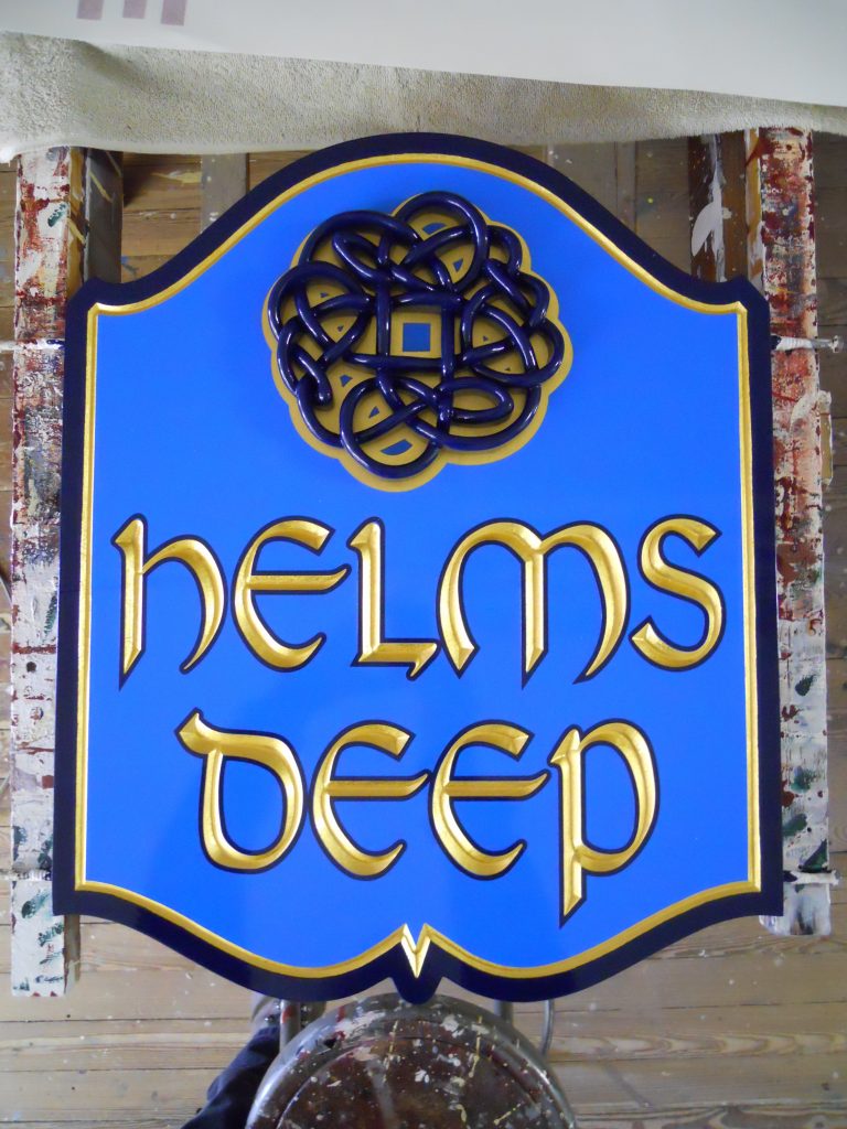 Helms Deep is carved HDU 23kt. gold leaf sign with applied graphic