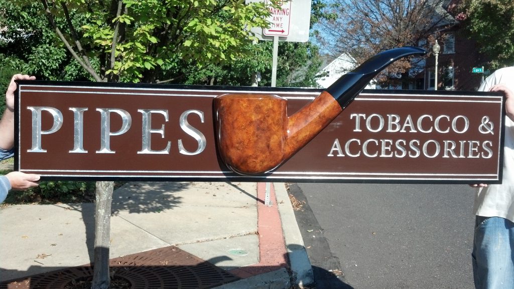 Cigars International Pipe sign is carved HDU silver leaf sign with applied hand carved HDU pipe